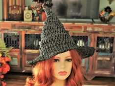 "Happy Summer-ween! You can certainly wear this witch hat all year, but it is specifically designed with Spring and Summer in mind! I made this from Raffia so it is airy, lightweight and still shapeable. Firm enough to stand on its own with that classic shape and the brim is wired. The more you scrunch it, the more crooked it gets. Airy enough to get through the heat and folds flat for travel. You can add your own flowers, pins, or whatever through the holes in the hat or wear it as is. The stit Black Witchy Hat For Halloween, Black Brimmed Witchy Costume Hat, Witchy Black Brimmed Costume Hat, Black Witchy Brimmed Costume Hat, Black Brimmed Halloween Hat, Black Brimmed Hat For Halloween, Black Brimmed Witchy Hat, Witchy Hat With Curved Brim, Whimsical Black Hat For Festival