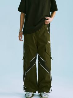 The Redux Cargo Pants feature a woven fabric body in a loose straight-leg fit. Paneled construction with contrast trim detailing. Embroidered logo to the front alongside slanted cargo pockets at each leg. Logo hardware adjustable drawcord waist and hem. Welt pockets to the sides with a single pocket to the back. Finished off with signature GRKC garment labels. Cargo Pockets Logo Hardware Elasticated Waist Straight Leg Fit No Restocks 100% Polyester Unisex Model Bo is 184cm / 6'0" tall and wearin Utility Pants, Mens Cargo, Garment Labels, Athletic Pants, Lake District, Contrast Trim, Welt Pockets, Cotton Poplin, Welt Pocket