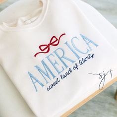 July 4th delivery cutoff: Must order on June 21st or sooner! I cannot accommodate last minute or rushed orders this year. Thank you for your support! America, sweet land of liberty! Your new favorite, ultimately comfy and cozy, patriotic sweatshirt! Wear this sweatshirt everywhere! Order from sizes S-3XL These are unisex sweatshirts, and they fit true to size! Look at your high school/ college/ sports tees and sweatshirts for sizing reference! This design is not customizable. This design and col College Embroidery Ideas, Embroidered Spirit Wear, Embroidery Designs Shirt, Monogram Ideas, Etsy Sweatshirts, Elle Fashion, Patriotic Outfit, Usa Shirt, Spirit Shirts