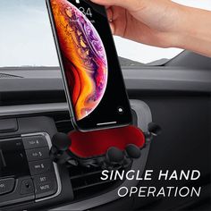 a person holding an iphone in their car with the text single hand operation on it