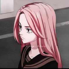 a girl with pink hair is staring at something