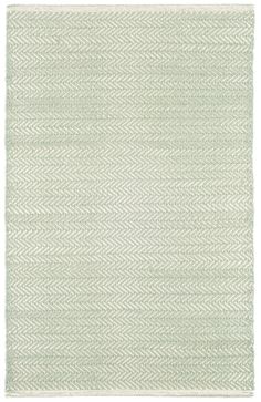 a green rug with white lines on it