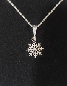 This beautiful pendant is the perfect addition to your holiday jewelry collection. The sterling silver snowflake design is intricate and eye-catching, with a rope chain that adds a touch of elegance.  The pendant is made by MAR CO JEWLERES, a trusted brand in the jewelry industry. It is crafted from 925 sterling silver and has a silver color. The pendant is designed for Christmas occasion and has a christmas theme, making it a great gift for the holiday season. The necklace is made in the United States and comes with a seller warranty for added peace of mind. Any questions please contact us Sterling Silver Snowflake Jewelry For Winter, Sterling Silver Jewelry For Winter Gifts, Sterling Silver Necklaces For Winter Gifts, Silver Jewelry As Winter Gift, Silver Jewelry For Winter Gift, Sterling Silver Snowflake Jewelry, Holiday Sterling Silver Necklaces, Silver Snowflake Necklace For Gift, Silver Snowflake Jewelry For Holidays