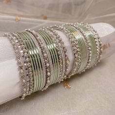 2 small half stacks of silver and light mint bangles. Ready to Ship! Packed loose in small gift box. (No roll) Bangle Box, Bangles Silver, Glass Bangles, Fancy Jewellery Designs, The Bangles, Bangles Set, Bracelets Design, Bangles Indian, Indian Jewelry Sets