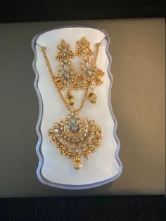 Beautiful Gold Necklace and Earring Set Gold Dangle Jewelry With Stone Work, Costume Jewelry Sets With Matching Earrings For Celebration, Gold Pendant Earrings With Stone Work, Beautiful Gold Necklaces, Beautiful Perfume Bottle, Beautiful Perfume, Rhinestone Heart, Handcrafted Necklace, Floral Necklace