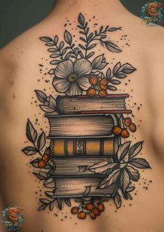 a woman's back with books and flowers on it