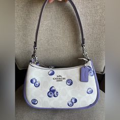 ***Come With Gift Receipt*** Coach Teri Shoulder Bag In Signature Canvas With Blueberry Print Coach Cr292 | Signature Coated Canvas And Smooth Leather | Two Credit Card Slots | Inside Multifunction Pocket | Zip-Top Closure, Fabric Lining | Detachable Handle With 8 1/4" Drop | Detachable Strap With 22 3/4" Drop For Shoulder Or Crossbody Wear | 9 1/2" (L) X 6" (H) X 3" (W)|Style No. Cr292| Coach Teri Shoulder Bag, Blueberry Print, Coach Nolita, Carryall Tote, Nike Tennis Dress, Signature Canvas, Walker Boots, Shoulder Tote Bag, Fit N Flare Dress