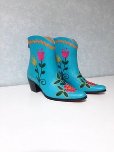 This is handmade embroidered suzani boots. Custom made women boots. Material is genuine leather. Style is cowboy, western boots. Handmade. *(There is heel 2 inches, 5 cm. ( possibile to make higher or shorter ). #leatherboots #customboots #suzaniboots #ankleboots #emmbroideredboots #womenboots #customboots #booties #giftforher #outdoorfit #sale #fashion #weddingfashion #weddingshoes #cowboyboots #western #bemyboots Traditional Embroidered Boots For Spring, Blue Bohemian Festival Boots, Handmade Ankle Boots For Festival, Cowboy Boots Ankle, Embroidery Boots, Boots Country, Turquoise Fashion, Womens Booties, Boots Cowgirl