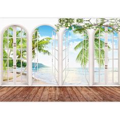 an open window overlooking the ocean with palm trees