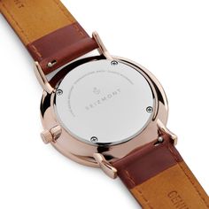 Seizmont from Denmark designs timepieces for men that are effortlessly elegant while being admirably functional. Features a perfectly polished, rose gold-tone super slim case. The second hand is tipped blue for an extra touch of class, and the porcelain white dial, matching up perfectly with the brown genuine leather strap. Japanese quartz powers the movement for infallible precision. Comes in an environmentally friendly storage box. Modern Rose Gold Watches With Subdials, Modern Rose Gold Watches, Modern Rose Gold Watch For Everyday Use, Modern Rose Gold Watch Accessories For Everyday, Timeless Rose Gold Watch Accessories, Modern Rose Gold Watch With Analog Display, Modern Rose Gold Watch Accessories With Diamond Hour Markers, Modern Rose Gold Watch Accessories With Subdials, Minimalist Dress