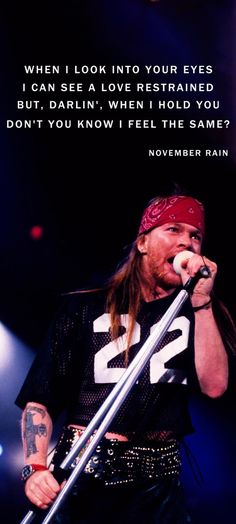 a man with long hair holding a microphone in front of a quote that reads, when look into your eyes