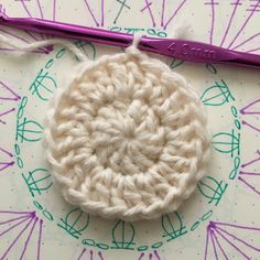 the crochet pattern is being used to make an ornament