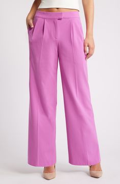 Add casual polish in these mid-rise pants tailored with neat pleats and flowy wide legs for a touch of comfort. 29" inseam; 22" leg opening; 11" front rise; 12 1/2" back rise (size 8) Zip fly with hook-and-bar closure Front slant pockets Lined 62% REPREVE® recycled polyester, 33% rayon, 5% spandex REPREVE recycled polyester is made from 100% post-consumer recycled plastic bottles Machine wash, tumble dry Imported Relaxed Fit Full Length Dress Pants For Spring, Spring Wide Leg Pleated Dress Pants, Spring Wide-leg Pleated Dress Pants, Spring Wide-leg Dress Pants With Relaxed Fit, Spring Pleated Wide Leg Dress Pants, Wide Leg Pleated Dress Pants For Spring, Casual Spring Wide Leg Pants With Pressed Crease, Spring Business Casual Full-length Dress Pants, Casual Wide Leg Pants With Pressed Crease For Spring