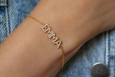 "This 14k personalized diamond name bracelet is the perfect gift for the bridal party, someone special, or yourself.  * All letters are capital. M A T E R I A L & L E N G T H Available in 14k Yellow Gold, 14k Rose Gold, 14k White Gold, Sterling Silver Stone: Natural Diamond Thickness: 1.2mm / 0.05\" Initials: 6 mm Diamond: 0.15 ct. - 0.40 ct. depending on the name Bracelet length: 6+1 inches (Please let us know if you prefer a different length) Color: G  Quality: SI-VS Additional Notes: * Non-Conflict Diamonds * Made in the USA E X C H A N G E / R E T U R N ∙ P O L I C Y Please let us know within 7 days of receipt. Ship the item back to us in its original condition. Get a full refund. Personalized items can be exchanged with 20% restocking fee. Full eternity bands can be exchanged with 15% Luxury Name Bracelet With Diamond Accents, Personalized Dainty Yellow Gold Diamond Bracelet, Personalized Adjustable Diamond Bracelet, Personalized Diamond Bracelet As A Gift, Dainty Personalized Diamond Bracelet As Gift, Dainty Personalized Diamond Bracelet For Gift, Dainty Yellow Gold Name Bracelet For Birthday, Elegant Gold Name Bracelet, Personalized Classic Diamond Bracelet As Gift