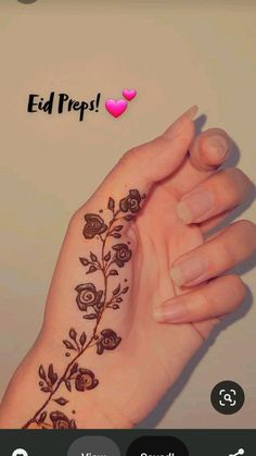 a woman's hand with a flower tattoo on it and the words ed trip written in