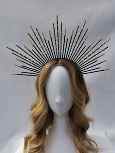 'Liberty' is a classic handmade black and gold crown with hand-painted spikes and individually added beads, diamonds, and glitter. It is the perfect unique accessory to add that wow factor to your outfit for any occasion, a Birthday party, Weddings, A Day at the Races, your festival outfit, Hen Parties, Engagements/Weddings, Halloween, Formals, and will be a great addition for photography or make-up artists.  I would be very happy to do custom orders to suit your requirements, for colourways and sizes just send me a message. This sturdy lightweight crown will also allow you to naturally style your hair.    *colour tone may vary because of the monitor display settings   *size may vary due to being handmade   Crowns from my studio are all artworks, each piece is original and made with love < Black And Gold Crown, Handmade Crowns, Black Hair Accessories, Festival Headpiece, Halo Crown, Halo Halo, Day At The Races, Black Headband, Gold Crown