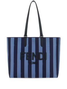 light blue/blue canvas vertical stripe pattern 3D-effect logo patch to the front two long top handles main compartment full lining with FF-logo jacquard internal zip-fastening pocket palladium-tone hardware open top Luxury Blue Bag With Embroidered Logo, Luxury Blue Bags With Embroidered Logo, Blue Shopping Bag With Embroidered Logo, Luxury Blue Canvas Bag, Blue Travel Bags With Logo, Blue Travel Bag With Logo, Blue Logo Travel Bags, Blue Rectangular Bag With Logo, Everyday Rectangular Shoulder Bag With Logo-jacquard Lining