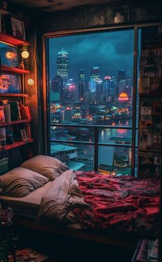 a bedroom with a view of the city at night