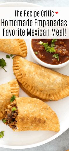 two empanadas on a white plate with salsa in the background and text overlay that reads, the recipe gritic homemade empanadaas favorite mexican meal