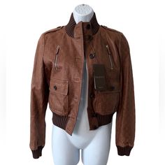 Authentic Gucci Gg Guccissma Leather Bomber Jacket Nwt- New Size 42 (Fits Like A Small Us 4-6) See Measurements Button Up Closure Knit Sweater Trim- 84% Cotton 12% Nylon 4% Elastane 6 Front Pockets Shoulder Epaulettes Material: 100% Leather Lining 100% Cotton Aprx Flat Measurements: Chest : 20" Waist 16.5" Length: 20" Sleeve: 25.5" From Shoulder Kept In Clean, Smoke-Free, Pet-Free Home Jacket Can Use A Conditioning, It Sat In The Closet Without Being Worn For Years. See Pics Of Color Distress Re Elegant Brown Gucci Outerwear, Gucci Luxury Leather Jacket For Winter, Brown Gucci Outerwear With Pockets, Gucci Brown Outerwear With Pockets, Gucci Brown Winter Outerwear, Brown Gucci Winter Outerwear, Luxury Gucci Outerwear For Fall, Designer Brown Gucci Outerwear, Gucci Tweed Jacket