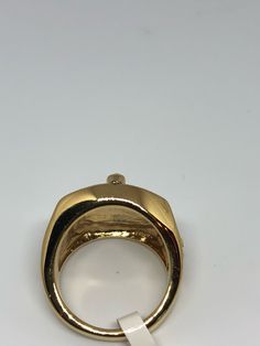 Cool Vintage Rock and Roll star men's ring Nice heavy ring, golden Stainless Steel Unused stock from the 1980's I have an assortment of sizes from 7 to 8 9 10 11 12- 13 Please add your size to the order in a message and I will send the size you require. If I am out of stock in your size, I will list the ones I have available for replacement. If I am sold out in the sizes you would prefer, I will cancel and refund you, Thank you All jewelry is shipped in a nice gift box. Check out our over a THOU Gold Stainless Steel Signet Ring For Anniversary, Gold Rectangular Metal Rings, Modern Gold Collectible Jewelry, Modern Gold Jewelry For Collectors, Modern Gold Dome Ring With Bezel Setting, Formal Metal Signet Ring With Polished Finish, Formal Polished Metal Signet Ring, Polished Metal Signet Ring, Gold Dome Ring With Polished Finish For Collectors