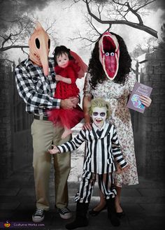 three adults and two children dressed up in costumes