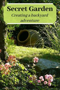 a garden with pink flowers in the foreground and a green sign that says secret garden creating a backyard adventure