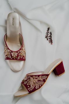 A beautiful and comfortable friend for your feet . The hand embroidered zardozi art is the perfect heels for you this wedding season. The insoles are made of soft foam to give you all day comfort. We can customise the heel as per your choice. Material : Velvet Heel in the picture: 2 inch block heel OutSole : Non slip TPR Color : Burgundy Embroidered High Heel Wedding Shoes, Festive Summer Heels High Heel, Festive Round Toe Heels For Party, Formal Embroidered High Heel Wedding Shoes, Festive Summer High Heels, Embroidered Low Heel Wedding Shoes, Formal Round Toe Heels With Embroidery, Traditional Open Toe Heels For Party, Red Block Heel Wedding Heels