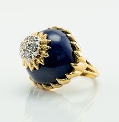 For all items above $1500 telephone number is required for shipping. International buyers contact us first before purchase. Genuine Diamond Ring, Blue Enamel Ring, 18k Gold Ring, Vintage Ring, Italian Ring, Blue Ring, Domed Ring. This collectible Italian vintage ring is crafted in solid 18K gold. Seven round brilliant cut natural diamonds are VVS2 clarity and G color totaling .35 carat. The domed top of the ring measures 19mm North-South. Size 5 (can be resized with a laser). This vintage ring w Fine Jewelry Diamond Enamel Ring With Brilliant Cut, Fine Jewelry Enamel Ring With Brilliant Cut Diamond, Blue Diamond Enamel Ring For Formal Occasions, Formal Blue Enamel Diamond Ring, Blue Diamond Ring With Cabochon Cut, Blue Diamond Cabochon Ring, Blue Cabochon Diamond Ring, Formal Round Enamel Diamond Ring, Yellow Gold Enamel Diamond Ring