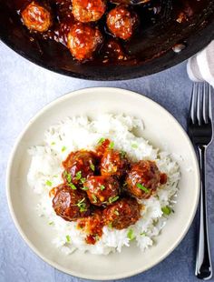 meatballs and white rice on a plate