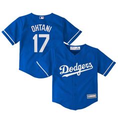 PRICES MAY VARY. Authentic MLB Jersey: This is an officially licensed Los Angeles Dodgers jersey for babies and toddlers aged 2-4 years old. Player-Inspired: The jersey features the name and number of Shohei Ohtani, the Japanese baseball superstar known for his dual talents as a pitcher and hitter. Alternate Design: The jersey showcases the Dodgers' alternate blue color scheme, adding a unique touch to your little one's baseball apparel collection. Comfortable Fit: Made from high-quality, breath Dodgers Jersey, Baseball Apparel, Japanese Baseball, Mlb Jersey, Baseball Outfit, Shohei Ohtani, Toddler Age, Blue Color Schemes, Baseball Game