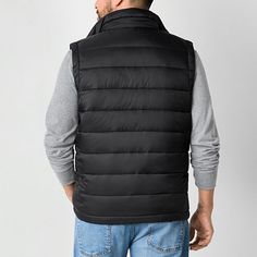 Stock up on layering essentials for cold weather with this stylish St. John's Bay men's puffer vest. Made from a warm blend, this lined midweight vest is packable and comes with a full zip closure and zip pockets. Wear it over a tee or sweater with jeans. Features: PackableClosure Type: ZipperPockets: 2 Side Zip PocketsWarmth Factor: MidweightApparel Length: 27 InchesOuterwear Length: ShortFiber Content: 100% NylonFabric Description: WovenFilling Content: 100% PolyesterLining: LinedLining Mater… Layering Essentials, Mens Puffer Vest, Puffer Vests, Puffer Vest, Cold Weather, Side Zip, Zip Pockets, Puffer, How To Wear