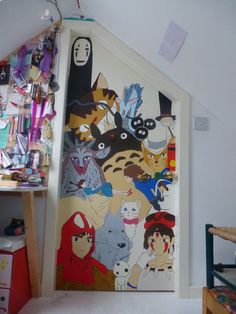 an open door with many cartoon characters painted on the front and back doors, in a child's bedroom