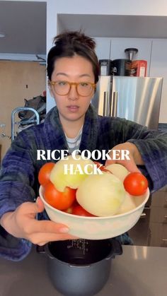 a man holding a bowl full of vegetables