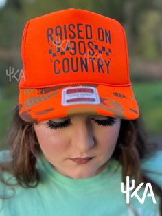 Get in touch with your country roots (or pretend you have some) with our Raised on 90's Country foam trucker hat. Perfect for attending concerts, festivals, or just channeling your inner cowboy/girl. A trendy accessory that will have you saying yeehaw (metaphorically, we hope). 90s Country, Cowboy Girl, Girl A, Congo Kinshasa, Isle Of Man, Trendy Accessories, Cayman Islands, Equatorial Guinea, Graphic Tees Women