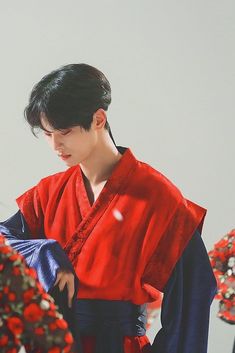 a man in a red and blue kimono