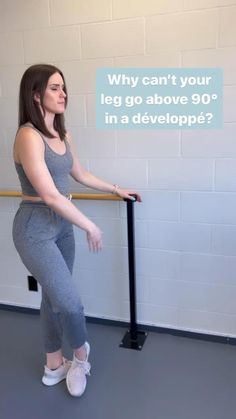 a woman is standing on a pole with her arms behind her back, and the caption says why can't your led go above 90 in a developing?