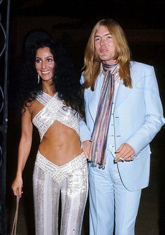 an image of two people posing for a photo on the instagramture page, with one person dressed as a belly dancer