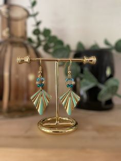 These new earrings are made in a unique model. They are made up of a brass element decorated by me and blue and green colored boho beads. The hooks are gold plated, so there is no risk in giving them away! Can be worn every day, they will also be perfect for an evening. You can also find all of Origine Bijoux on Etsy, Facebook and Instagram. Green Pierced Jewelry For Party, Nickel-free Green Earrings For Party, Green Nickel-free Party Earrings, Nickel-free Green Beaded Earrings For Parties, Dangle Beaded Brass Earrings For Gifts, Beaded Dangle Brass Earrings For Gifts, Green Metal Beaded Party Earrings, Brass Beaded Hoop Earrings As Gift, Gift Brass Beaded Dangle Earrings