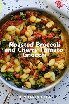 roasted broccoli and cherry tomato gnocchini in a pan with the title