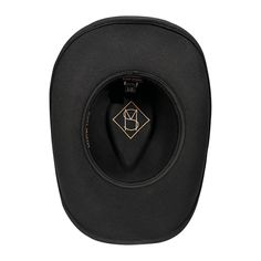 The Saint Martin Black Wool Felt Shapeable Cowboy Hat is a fine style that is simultaneously elegant and simple. Featuring a 3.5" brim all around with wire inside to re-shape as needed, this hat can be crushed and with a little re-forming be good as new! Trim includes a black faux-leather band with 6 silver conchos and studs ending at the back with 4 felt tassels. Inside you'll find a comfortable sweatband with Saint Martin script and the SM logo imprinted in the crown. THE DETAILS: Brim: 3.5" Shapeable Crown: 4.5" at front, 5" on sides Crown Shape: Teardrop Sm Logo, Felt Cowboy Hat, Upf Clothing, Outback Hat, Felt Cowboy Hats, Western Cowboy Hats, The Saint, Saint Martin, 5 S