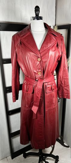 "Vtg Learsi Uruguay 70s Burgundy Leather Trench, Full Zip Removable Faux Fur Liner, Small. Very rare $225 leather tailor work reinforcing shoulder and neck seams Measurements: Shoulder to Shoulder: 17.5\" Chest: 39\" Waist: 31\" Length: 42\" Sleeve Length: 22\"" Vintage Red Leather Outerwear, Retro Leather Outerwear For Formal Occasions, Vintage Red Outerwear For Office, Vintage Belted Outerwear For Formal Occasions, Belted Vintage Outerwear For Formal Occasions, Long Leather Coat, Leather Trench, Historical Fashion, Leather Coat