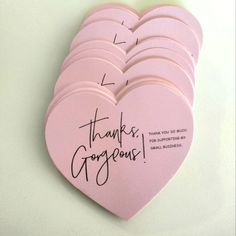 pink heart shaped thank you're gorgeous magnets with black writing on each one