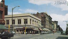 an old photo of a busy city street