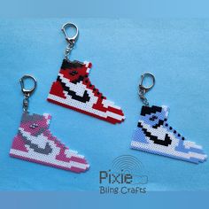 three pairs of pixelated shoes are shown on a blue background with the word pixel