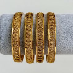 Indian Gold bangles, Temple Jewelry, South Indian bangles, Kada bangles, Indian Jewelry, Pakistani jewelry  Antique Plain  Gold Bangles With Gold Plating Set of 4 bangles  Bollywood Look Another design can be found here  https://www.etsy.com/listing/1253061664/indian-gold-bangles-temple-jewelry-south?click_key=9c29ea626853d32f2ae90fd01a109e7d30dea351%3A1253061664&click_sum=e19697ff&ref=shop_home_active_7&pro=1&sts=1 https://www.etsy.com/listing/1253056418/indian-gold-bangles-temple-jewelry-south Festival Stackable Bangles, Festival Stackable Bangle, South Indian Bangles, Indian Gold Bangles, Plain Gold Bangles, Kada Bangles, Gold Bangles Indian, Indian Bangles, Jewelry Pakistani