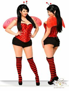 two women dressed in red and black outfits