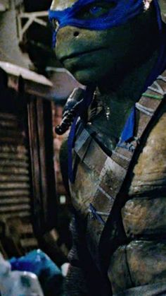 the teenage mutant from teenage mutant is shown in this still - life scene, with blue paint on his face and chest