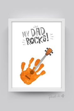 an orange handprint with the words, my dad rock on it is in front of a