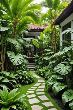 a garden with lots of green plants and trees